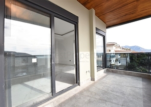 3+1 apartment in a new complex with sea view and Alanya fortress