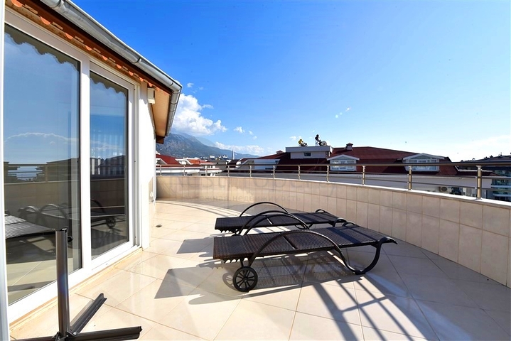 4+1 duplex penthouse in Kestel area, just 20 m from the sea