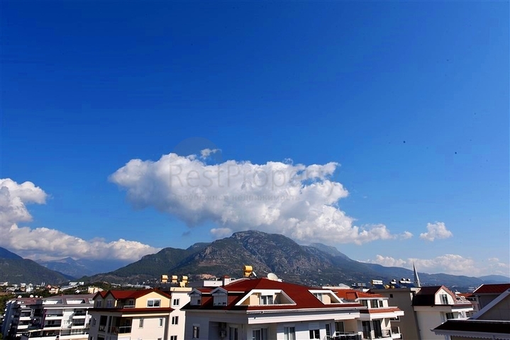 4+1 duplex penthouse in Kestel area, just 20 m from the sea