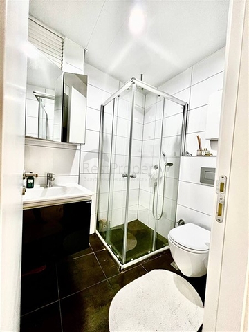 Spacious one-bedroom apartment in a residential complex with developed infrastructure in Kestel