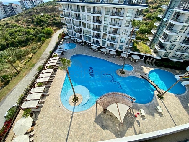 Spacious one-bedroom apartment in a residential complex with developed infrastructure in Kestel