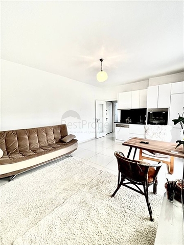 Spacious one-bedroom apartment in a residential complex with developed infrastructure in Kestel