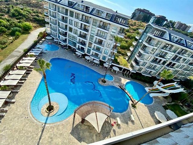 Spacious one-bedroom apartment in a residential complex with developed infrastructure in Kestel