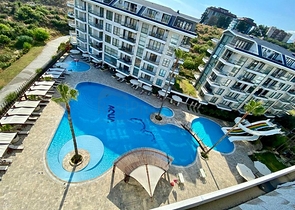 Spacious one-bedroom apartment in a residential complex with developed infrastructure in Kestel