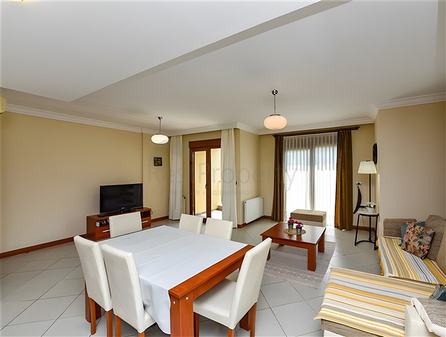 Furnished 2+1 apartment in a complex on the first coastline in the center of Alanya