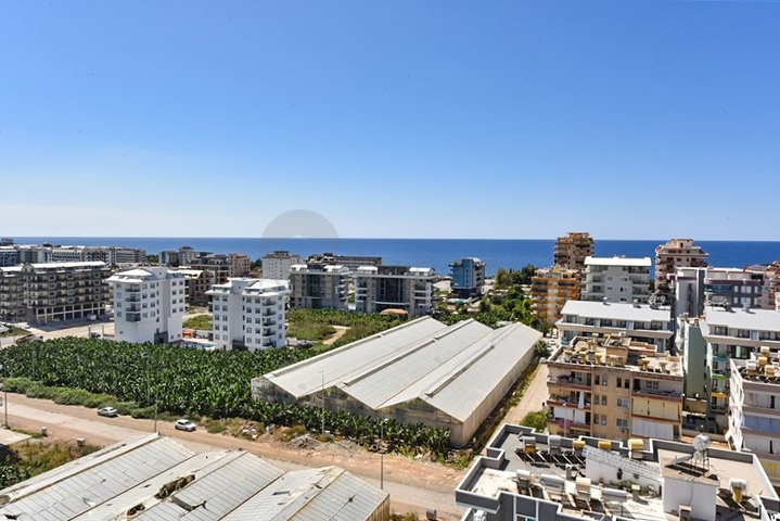 Furnished 4+1 penthouse with sea view in Mahmutlar