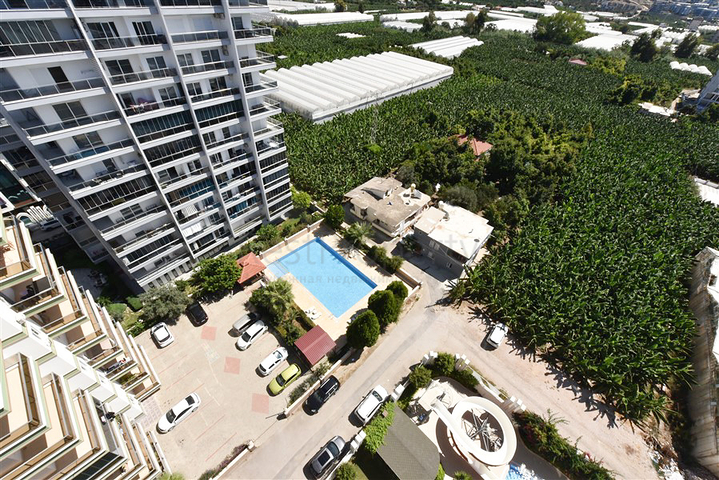 Furnished 4+1 penthouse with sea view in Mahmutlar