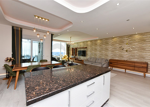 Furnished 4+1 penthouse with sea view in Mahmutlar