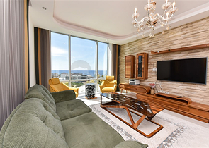 Furnished 4+1 penthouse with sea view in Mahmutlar