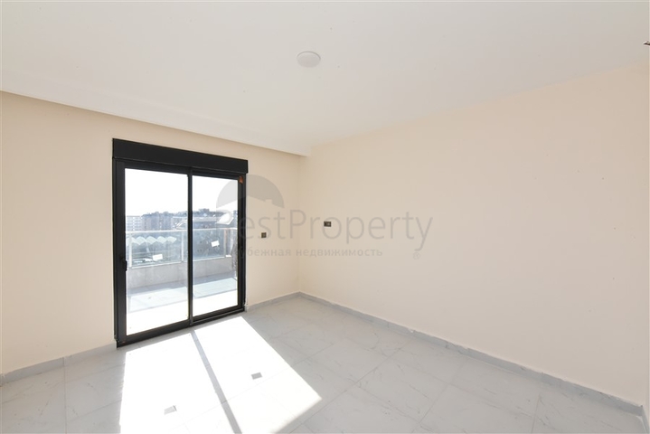 2+1 penthouse in a new house 400 m from the sea 