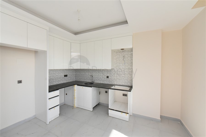 2+1 penthouse in a new house 400 m from the sea 