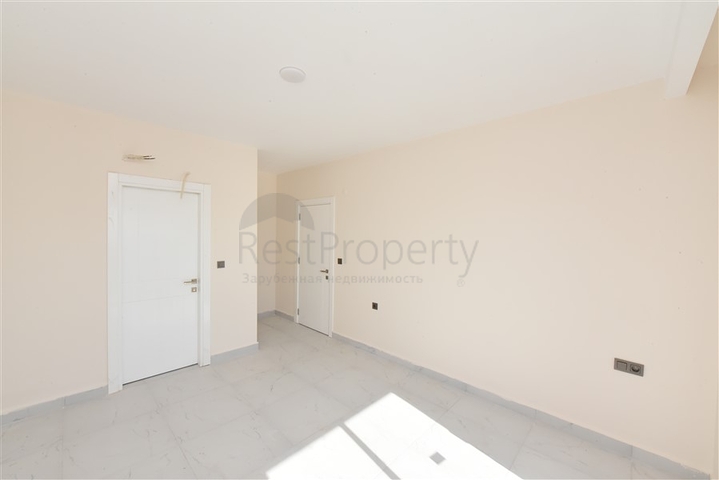 2+1 penthouse in a new house 400 m from the sea 