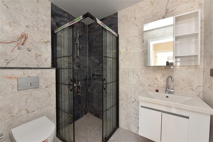 2+1 penthouse in a new house 400 m from the sea 