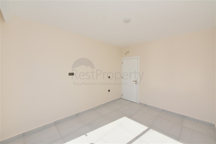 2+1 penthouse in a new house 400 m from the sea 