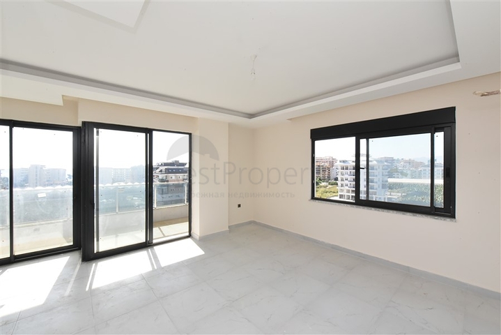 2+1 penthouse in a new house 400 m from the sea 