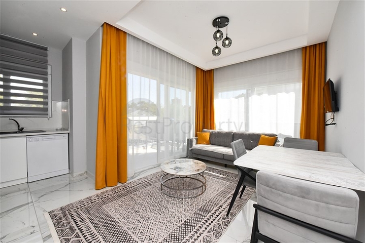 Furnished 1+1 apartment in a new complex in Avsallar