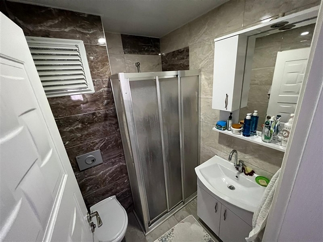 Spacious two-bedroom apartment within walking distance to the sea in the area of Tosmur open for residence permit