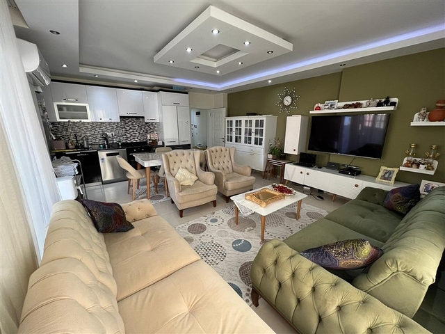 Spacious two-bedroom apartment within walking distance to the sea in the area of Tosmur open for residence permit