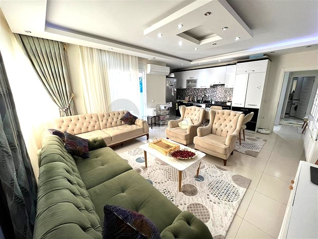 Spacious two-bedroom apartment within walking distance to the sea in the area of Tosmur open for residence permit