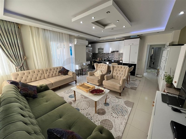 Spacious two-bedroom apartment within walking distance to the sea in the area of Tosmur open for residence permit
