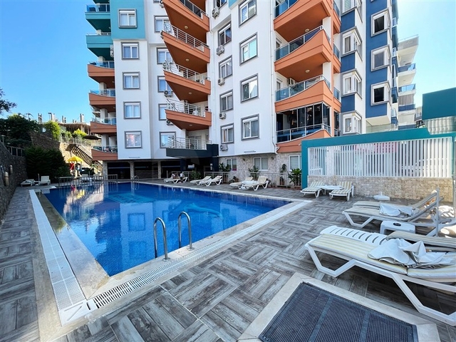 Spacious two-bedroom apartment within walking distance to the sea in the area of Tosmur open for residence permit