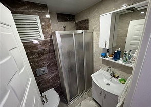 Spacious two-bedroom apartment within walking distance to the sea in the area of Tosmur open for residence permit