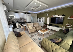 Spacious two-bedroom apartment within walking distance to the sea in the area of Tosmur open for residence permit