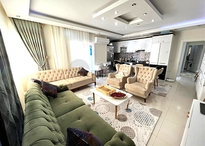 Spacious two-bedroom apartment within walking distance to the sea in the area of Tosmur open for residence permit