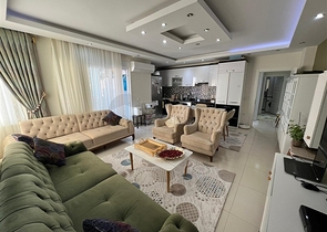 Spacious two-bedroom apartment within walking distance to the sea in the area of Tosmur open for residence permit