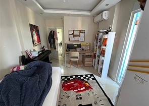 Spacious two-bedroom apartment within walking distance to the sea in the area of Tosmur open for residence permit