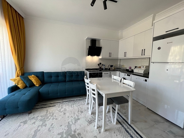 Apartment 1+1 in the middle of a coniferous grove