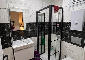 Apartment 1+1 in the middle of a coniferous grove