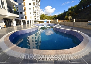 Apartment 1+1 in the middle of a coniferous grove