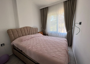 Apartment 1+1 in the middle of a coniferous grove