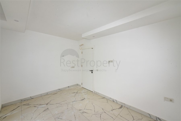 1+1 apartment with mountain and sea views in Mahmutlar district