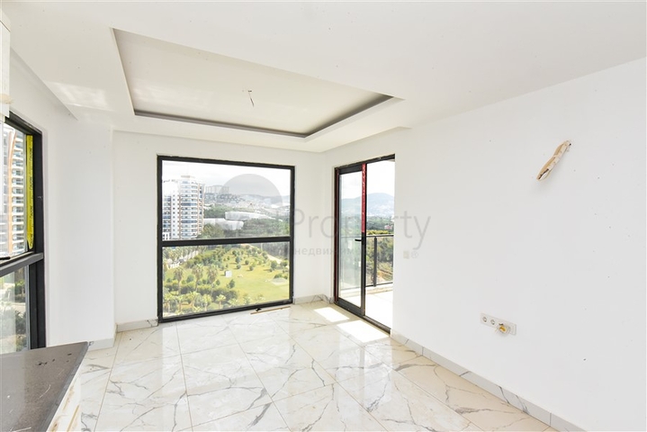 1+1 apartment with mountain and sea views in Mahmutlar district