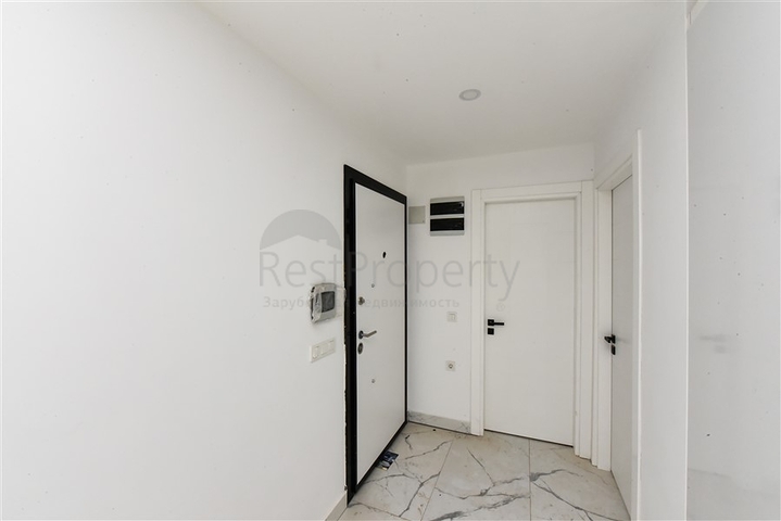 1+1 apartment with mountain and sea views in Mahmutlar district