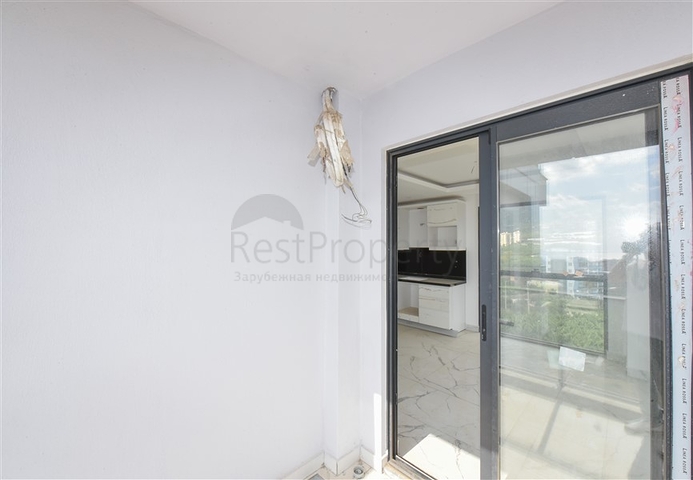 1+1 apartment with mountain and sea views in Mahmutlar district