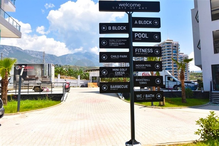 1+1 apartment with mountain and sea views in Mahmutlar district