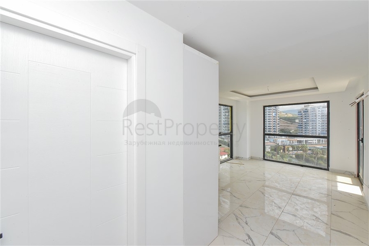 1+1 apartment with mountain and sea views in Mahmutlar district