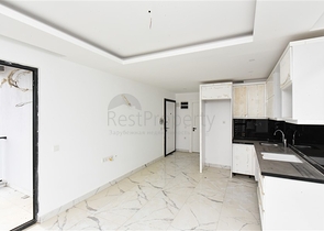 1+1 apartment with mountain and sea views in Mahmutlar district