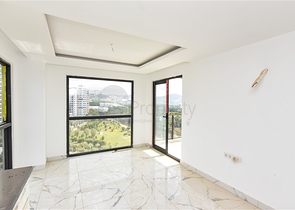 1+1 apartment with mountain and sea views in Mahmutlar district