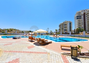 1+1 apartment with mountain and sea views in Mahmutlar district