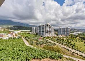 1+1 apartment with mountain and sea views in Mahmutlar district