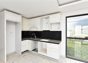 1+1 apartment with mountain and sea views in Mahmutlar district