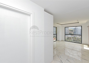 1+1 apartment with mountain and sea views in Mahmutlar district