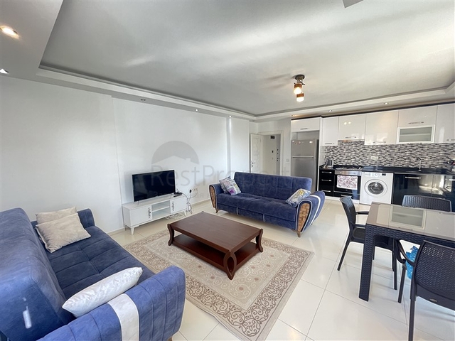 Spacious two-bedroom apartment with a large balcony and sea view