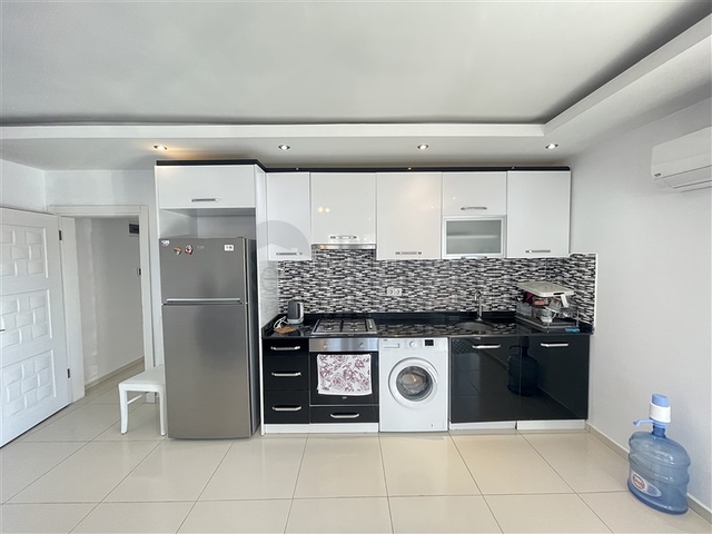 Spacious two-bedroom apartment with a large balcony and sea view