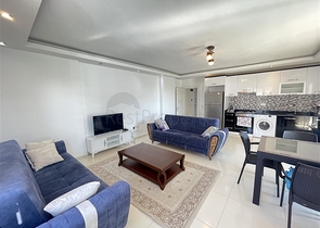 Spacious two-bedroom apartment with a large balcony and sea view