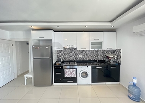 Spacious two-bedroom apartment with a large balcony and sea view